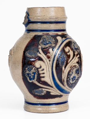 Cobalt-and-Manganese-Decorated Westerwald Stoneware Mug w/ Sprig-Molded Decoration, 1688