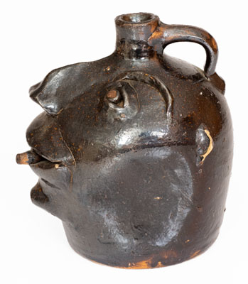 Exceptional Stoneware Cigar-Smoking Face Jug, probably Brown Family, Atlanta