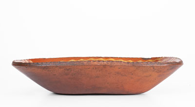 Slip-Decorated Redware Loaf Dish, PA origin, second quarter 19th century