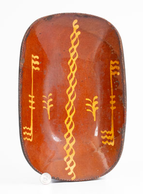 Redware Loaf Dish w/ Slip Decoration, Pennsylvania origin, second quarter 19th century