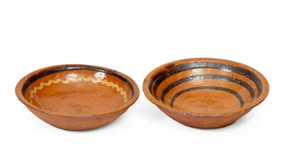 Two Small Slip-Decorated Redware Bowls, Mid-Atlantic or Southern origin, early to mid 19th century