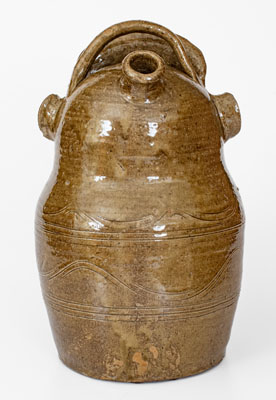 Outstanding and Important Alkaline-Glazed Alabama Stoneware Torso Jug, Inscribed 