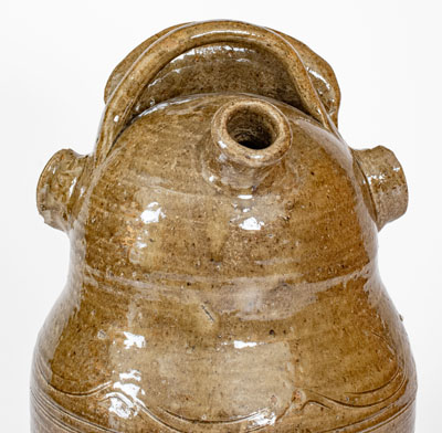 Outstanding and Important Alkaline-Glazed Alabama Stoneware Torso Jug, Inscribed 