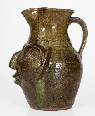 B.B. CRAIG / VALE, N.C. Alkaline-Glazed Stoneware Face Pitcher