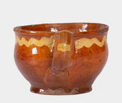 Extremely Rare Slip-Decorated Redware Cup, probably Charlestown, Massachusetts, 18th century