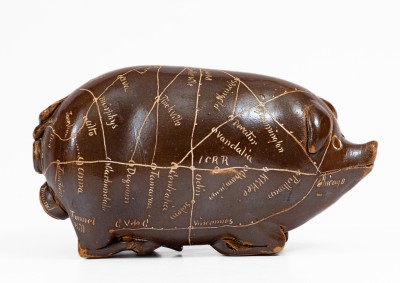 Anna Pottery Pig Flask with Incised Railroad Map, Dated 1890. 