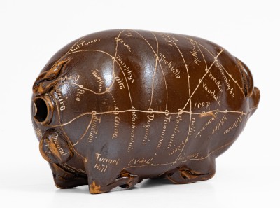 Anna Pottery Pig Flask with Incised Railroad Map, Dated 1890. 