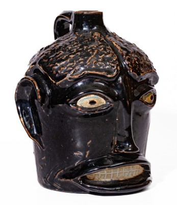 Rare Brown-Glazed Stoneware Face Jug, attributed to Ernest Galloway, Paducah, KY, early 20th century.