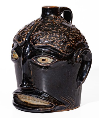 Rare Brown-Glazed Stoneware Face Jug, attributed to Ernest Galloway, Paducah, KY, early 20th century.