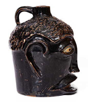 Rare Brown-Glazed Stoneware Face Jug, attributed to Ernest Galloway, Paducah, KY, early 20th century.