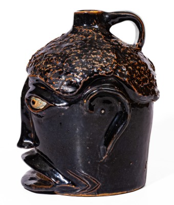 Rare Brown-Glazed Stoneware Face Jug, attributed to Ernest Galloway, Paducah, KY, early 20th century.