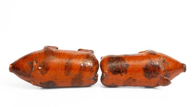 Rare Pair of Berks County, Pennsylvania Redware Pig Figures, 19th century