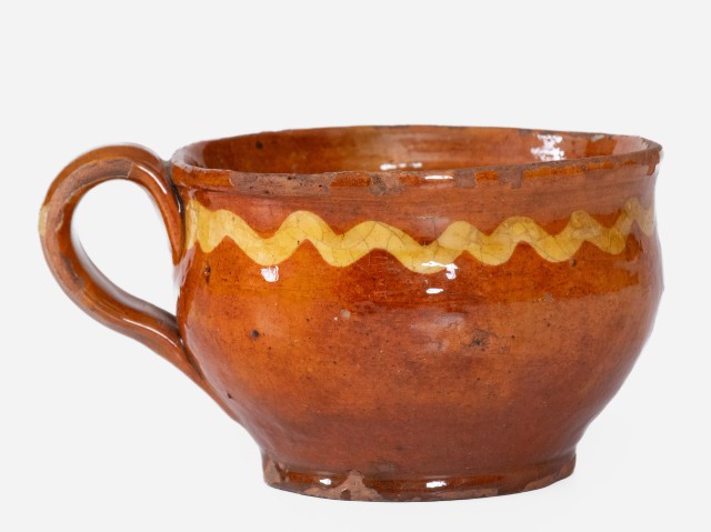 Extremely Rare Slip-Decorated Redware Cup, probably Charlestown, Massachusetts, 18th century