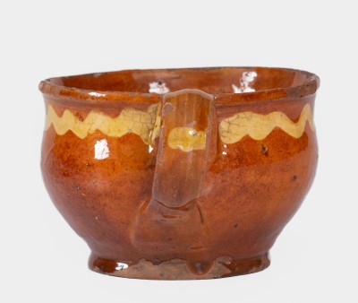 Extremely Rare Slip-Decorated Redware Cup, probably Charlestown, Massachusetts, 18th century